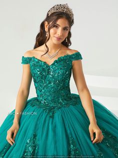 You'll love twirling around in this sequin embroidered long off the shoulder dress with A-line skirt by House of Wu 26002. Made out of tulle, this beautiful off shoulder ball gown features a sweetheart bodice adorned with sequin embroidery appliques, short sleeves, open back, and a floor length A-line skirt embellished with sequins embroidery applique and finishing edge. This look is finished with a lace-up corset back and a sweep train. Note: Cape is not included. Cape Style #30138. House of Wu Green Quince Dress, Green Quinceanera Dresses, Quinceanera Collection, Off Shoulder Ball Gown, Long Mermaid Dress, Sheath Wedding Dress Lace, Tulle Balls, Quince Dress, Quinceanera Dress