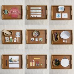 six wooden trays with various items on them, including magnets and paper clips