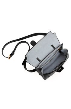 More than an elevated fanny pack, the Aria Belt Bag can fit any size phone, wallet, and other essentials. With exterior and interior loops, and an adjustable, removable leather strap, the Aria can be worn 5 ways: as a belt bag, a crossbody, a shoulder bag, a sling bag, or a clutch. Wear 5 Ways: Belt Bag, Sling, Shoulder, Crossbody, Clutch Scratch & water-resistant Italian Pebbled leather What Fits: Any size phone; card slots, interior zip pocket for essentials Removable and adjustable leather st Modern Top Handle Saddle Bag With Removable Pouch, Modern Crossbody Saddle Bag For Travel, Modern Travel Crossbody Saddle Bag, Versatile Business Saddle Bag With Removable Pouch, Rectangular Bag Strap With Cell Phone Pocket For On-the-go, Modern Top Handle Camera Bag For Everyday Use, Modern Business Saddle Bag With Removable Pouch, Versatile Belt Bag For On-the-go, Versatile Saddle Bag With Detachable Strap For Travel