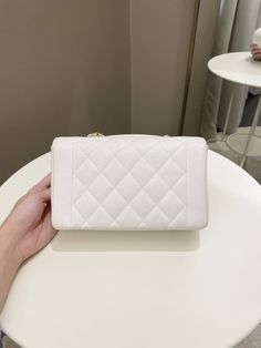 Chanel Vintage Quilted Diana Flap BagWhite Caviar24K Gold Plated HardwareSize 22 x 14 x 7.5 cmChain drop 50 cm3 series9-9.5/10 Vintage (pristine vintage with minimal vintage signs of use. Well structured)Includes box and dust bagPrice now 8999 sgd 6710 usd CN5249-01