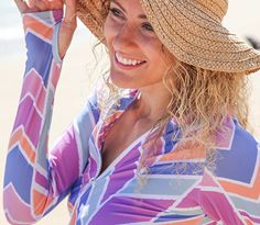 SwimZip's "Cali Girl" long sleeve rash guard shirt is perfect for a day out around the beach or pool. With SPF 50+ (UPF), this stylish shirt looks good and blocks 98% of UVA and UVB rays. For easy all day sun protection, be sure to choose SwimZip's adult woman UV swimwear. SwimZip's women's long-sleeve rashguard swim shirts are pool or beach bag essential and are right on target to keep skin healthy and stay sunburn free with an amazing fit. Adidas Swimsuit, Swim Shirts For Women, Athletic Bikinis, Sun Safety, Rash Guard Swimwear, Swim Shirt, Long Sleeve Rashguard, Cali Girl, Rash Guard Women