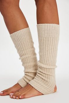 Sure to be the coolest addition to your accessories collection, these totally timeless legwarmers are featured in a sleek, ribbed knit fabrication and toe-less, heel-less style for the perfect wear-anywhere style. | Ribbed Stirrup Legwarmers by Hansel From Basel at Free People in White Stirrups, Accessories Collection, Basel, Boho Clothing, Ribbed Knit, Free People, Sleek, Cream, Knitting