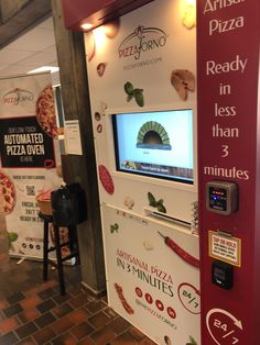 a vending machine that has pizza on the front and side of it with information about how to use it