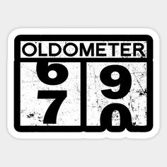 a white and black oldometer sign with the number seven on it's side