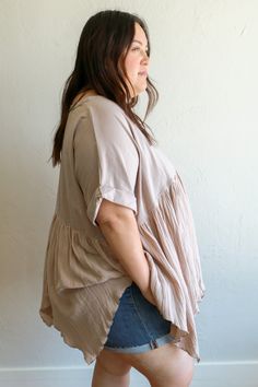 Stay stylish and comfortable with the Madelyn Plus Size Babydoll Top! This oversized top is perfect for any occasion, featuring a unique split neck and mixed fabric detail in a babydoll-inspired design. Just throw it on and go for effortless style (no effort required)! Fabric: 95% COTTON 5% SPANDEX Plus Size Babydoll, Oversized Top, Babydoll Top, Bottoms Pants, Effortless Style, Denim Dress, Sweater Hoodie, Jumpsuit Dress, Denim Skirt