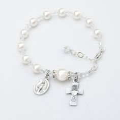 First Holy Communion Gift for Girls  White by RosariesOfLove Elegant Rosary Bracelet For First Communion With Round Beads, Elegant Rosary Bracelet With Round Beads For First Communion, Pearl Bracelet For First Communion, Adjustable Pearl Bracelet For First Communion, White Pearl Charm Bracelet For First Communion, Pearl White Bracelet For First Communion, White Pearl Bracelet For First Communion, Pearl White Pearl Bracelet For First Communion, White Hypoallergenic Pearl Bracelet For First Communion