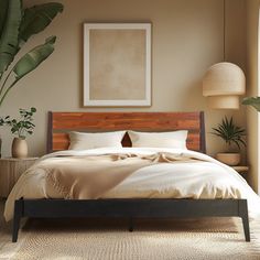 a large bed sitting next to a window in a room with potted plants on the side