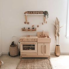 The Milton & Goose Essential Play Kitchen in natural sits in a play space filled with natural light. Play Kitchen Accessories, Wooden Play Kitchen, Magnolia Baby, Play Kitchen Sets, Bow Shop, Learn Crafts, Holiday Books, Musical Toys, Play Kitchen