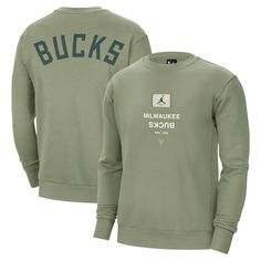 Channel courtside comfort and Milwaukee Bucks pride with the Jordan Brand Statement Edition Sweatshirt. This heavyweight pullover features a fleece lining and rib-knit cuffs and waistband for ultimate warmth and comfort during colder temperatures. The bold team graphics on the front and back make it clear you're a dedicated Milwaukee Bucks fan. Fall Season Team Logo Sweatshirt, Fleece Sweatshirt For Fan Gear In Sportswear Style, Winter Fan Apparel Sweatshirt With Moisture-wicking, Fleece Sportswear Sweatshirt For Fan Gear, Throwback Long Sleeve Tops With Team Logo, Fleece Sweatshirt For Fan Gear, Winter Moisture-wicking Sweatshirt Fan Apparel, Team Logo Sweatshirt For Sports Events In Fall, Fan Gear Sportswear Hoodie With Crew Neck