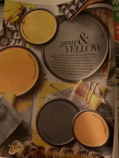 an article in a magazine with yellow and gray colors on the pages, including paint