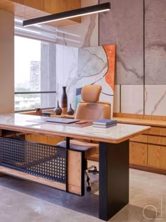 an office with marble and wood accents