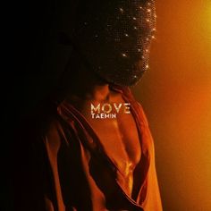 a person wearing a mask with the words move team on it's chest and back