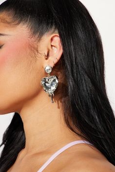 Available In Gold/Pink And Silver. Drop Earrings Heart Design Drip Detail Rhinestone Detail Post Back Closure Final Sale Imported | Bleeding Love Earrings in Silver by Fashion Nova Silver Heart Pierced Earrings For Party, Heart Shaped Pierced Jewelry For Party, Heart Shaped Pierced Party Jewelry, Glamorous Heart Shaped Evening Earrings, Heart Shaped Crystal Jewelry For Pierced Ears, Heart-shaped Clip-on Earrings For Formal Occasions, Silver Heart Drop Earrings, Glamorous, Glamorous Silver Heart Earrings With Rhinestones, Elegant Heart Shaped Clip-on Earrings For Party