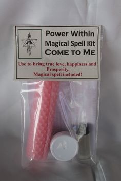 the package contains two pink toothbrushes and an electric toothpaste rollers