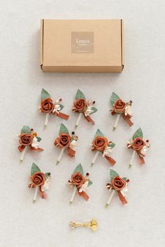 the small boutions are made from paper roses