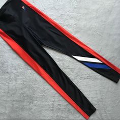 Excellent Used Condition. The Knockout Leggings By P.E. Nation In Black With Red, White And Blue Detailing. Athleisure Aesthetic, Great For A Workout Or The Gym. High-Rise Second Skin Leggings Made To Contour To Your Body. Athletic Stripe Detail Along Each Side And Left Calf, With Embroidered Logo At Hip. Size Xs, See Photos For Measurements. Sporty Color Block Workout Bottoms, Red Color Block Sports Bottoms, Black Activewear With Contrast Stripes For Workout, Sporty Color Block Leggings For Sports, Sporty Compression Pants For Streetwear, Black Athleisure Bottoms With Contrast Stripes, Black Stretch Activewear With Contrast Stripes, Athleisure Activewear With Side Stripes And Stretch, Fitted Activewear With Side Stripes For Sports