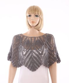 a mannequin wearing a crocheted top