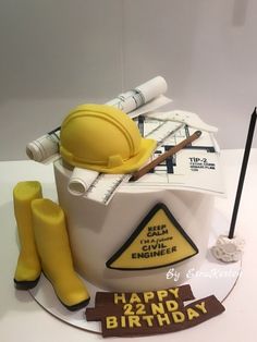 a birthday cake with construction equipment on it