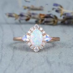 This Is A Beautiful And Well Made Lab Created Opal Gemstone Ring With High Quality Stones On Each Side And Around The Ring. It Is Rose Gold Filled, Not Plated For Better Quality And Longer Lasting Wear. Size 7 Opal Birthstone Ring, Rose Gold Opal Ring, Opal Moonstone, Dainty Engagement Rings, Opal Birthstone, White Opal Ring, Opal Wedding Rings, Opal Ring Gold, Fire Opal Ring