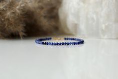 "This delicate gemstone bracelet is made of Genuine Sodalite and sterling silver clasp. Sodalite brings order and calmness to the mind. It encourages rational thought, objectivity, truth, and intuition, along with the verbalization of feelings. ▪️ Zodiac - Sagittarius ▪️ Birthstone - November . ❗️Sign up to our Newsletter and get 15% OFF your order (copy this link to browser search) - https://forms.gle/R74xLdL1MSmC9Apn6 ❗️ . 🔸 MEASUREMENTS🔸 ▪️ Gemstones: Sodalite ▪️ Beads size: 3 mm ▪️ Clasp: Dainty Blue Faceted Beaded Bracelets, Blue Gemstone Beads Minimalist Bracelets, Minimalist Blue Gemstone Bead Bracelets, Dainty Blue Gemstone Beaded Bracelets, Blue Dainty Gemstone Beaded Bracelet, November Sign, Sagittarius Birthstone, Blue Lace Agate Bracelet, Sodalite Bracelet