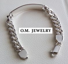 "ID CURB MEN'S 925 STERLING SILVER BRACELET Material : Highest Quality Solid 925 Sterling Silver Bracelet width : 0.4\" (10 mm) Weight : 1.96 oz (55 gr.) We will ship WorldWide. The order will be shipped by REGISTERED AIR MAIL" Classic Sterling Silver Bracelet With Curb Chain, Classic Engraved Cuban Link Jewelry, Sterling Silver Cuban Link Bracelet Gift, Sterling Silver Bracelets With White Gold Curb Chain, Sterling Silver Nameplate Jewelry With Curb Chain, Silver Sterling Silver Curb Chain Bracelet, Engraved Silver Cuban Link Bracelet, Personalized Silver Oval Link Chain Bracelet, Engraved Sterling Silver Cuban Link Jewelry