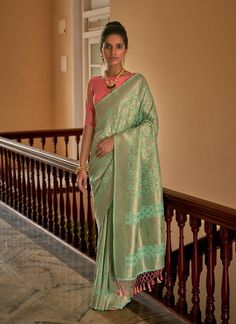 Looking for a touch of elegant Bollywood style? Look no further than our gorgeous sea green saree. Made from luxurious nylon crape fabric, this saree features intricate weaving all over, creating a stunning, eye-catching look. The attached tassels add a beautiful touch to the saree pallu, making it the perfect gift for any woman. Elevate your wardrobe with this saree and add a touch of Bollywood glamour to any occasion. The unstitched blouse can be customized upto 44 inches. Do Note: All the acc Pista Green Saree, Saree Ready To Wear, Saree Pallu, Bollywood Glamour, Pista Green, Blouse Details, Purple Saree, Orange Saree, Ethnic Sarees