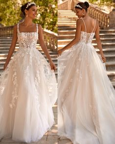 two women in wedding dresses walking down stairs