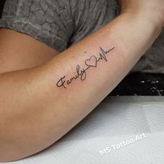 a woman's arm with a tattoo that says faith and heart on the side