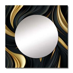 a round mirror sitting on top of a black and gold wall mounted art piece,