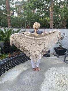 "Gorgeous Flowy Ultra suede shawl, shawl, wrap, Tan, Cream, fringed, Piano scarf, Extra long fringe, Cut out Shawl Beautiful large light creamy tan cut out shawl, dancing shawl with long fringe 36\" top to bottom additional 8\" fringe 74\" end to end NKBXLR Gorgeous Flowy Ultra suede shawl, shawl, wrap, Tan, Cream, fringed, Piano scarf, Extra long fringe, Cut out Shawl" Shawl Outfit, Boho Shawl, Glitter Fashion, White Cotton Blouse, Fringe Shawl, Wardrobe Planning, Fringed Poncho, Long Fringe, Long Fringes