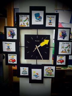 a clock with pictures on it and a yellow arrow in the middle is surrounded by magnets