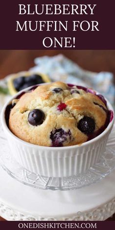 blueberry muffin in a white bowl on a plate with the title overlay