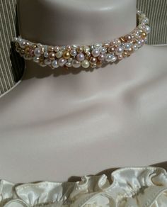 "Stassi asked me to design a pearl choker for her for her recent trip to New Orleans. She picked out the colors of the pearls which are mostly freshwater pearls a few cultured and glass pearls. She wanted the soft colors which include white, ivory, light pink, medium pink, peach and gold. Each pearl is sewn onto satin ribbon several times and finished with a burlap thick ribbon that gives the choker backbone. The choker that Stassi wears is 13\" inches with an additional 4\" inch extension chain Handmade White Pearl Choker, White Choker With Pearl Pendant And Round Beads, White Pearl Embellished Choker Necklace, Handmade Pearl White Pearl Choker, Adjustable Cream Pearl Necklace, Trip To New Orleans, Peach And Gold, Lake Arrowhead, Pink Peach