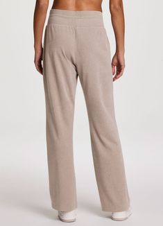 Cozy up in our ultra versatile Oliver Plush Wide Leg Pant. Super soft fabric stretches and moves with you while helping to keep you warmer without being heavy or restrictive during your workouts, hikes or lounge sessions. A wide leg design with a relaxed fit offers enhanced breathability and optimal comfort, while functional details like side pockets and a flattering wide, drawstring elastic waistband provide the functionality you're looking for in a women's sweat pant. Versatile Relaxed Fit Yoga Pants For Lounging, Solid Color Comfort Stretch Pants For Relaxation, Comfort Stretch Pants For Relaxation, Full Length 4-way Stretch Pants For Loungewear, Sporty Yoga Pants With Elastic Waistband For Relaxation, Relaxation Activewear With Elastic Waistband, Comfortable Yoga Pants With Loosely Fitted Hips For Relaxation, Casual Wide Leg Activewear For Relaxation, Versatile Full-length Yoga Pants For Lounging