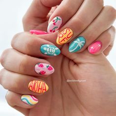 Capture the essence of a tropical vacation with nails adorned with island-themed motifs. Each nail showcases different designs like palm trees, surfboards, and fruity patterns, all in vivid colors like turquoise, yellow, and pink. The smooth, oval shape and glossy finish highlight the fun and relaxed summer vibe, making this manicure a standout choice.@polishedbyaves Surfer Nails, Coast Nails, Vaca Nails, Summer Beach Nails, Hawaii Nails, Preppy Inspo, Spring Break Nails