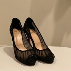 These Are An Authentic Pair Of Christian Louboutin Satin Chiffon Ambrosina Peep Toe Pumps In Black, Size 40. These Are A Very Elegant Pair Of High Heel Pumps With A Distinctive Look. The Heel And Back Are A Shimmery Satin With Sheer Pleated Chiffon Uppers Featuring A Peep Toe, And Signature Red Lacquered Soles. These Are Excellent Heels For Evening, With The Unmistakable Look Of Christian Louboutin! Luxury Mesh Heels For Formal Occasions, Elegant Mesh Heels For Night Out, Evening Mesh Heels Fitted, Evening Mesh Fitted Heels, Fitted Mesh Evening Heels, Elegant Mesh Heels, Designer Fitted Heels For Cocktail, Luxury Wishlist, Pleated Chiffon