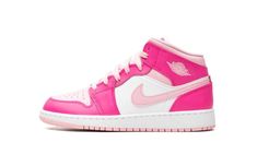 The Air Jordan 1 Mid GS “Fierce Pink” is the youth sizing of the lifestyle shoe with pink accents that give it a can’t-miss look.  The colorway is complete with a Medium Soft Pink leather toe with Fierce Pink leather overlays.  Medium Soft Pink accenting is also seen on the leather Swoosh on the sides and on the collar.  A classic “Wings” logo appears on the overlay on the collar and a Jumpman is found on the tongue.  Underfoot, the white rubber midsole and pink rubber outsole put the finishing Air Jordan 1 Mid Gs, Pink Jordans, Sneakers Box, Kobe Shoes, Preppy Shoes, Nike Air Jordan 1 Mid, Cute Nike Shoes, Cute Nikes, Stadium Goods