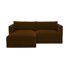 a brown couch sitting on top of a white floor