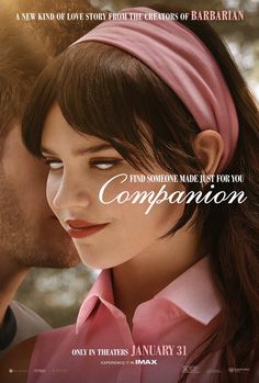 the movie companion features an image of a man kissing a woman in front of him