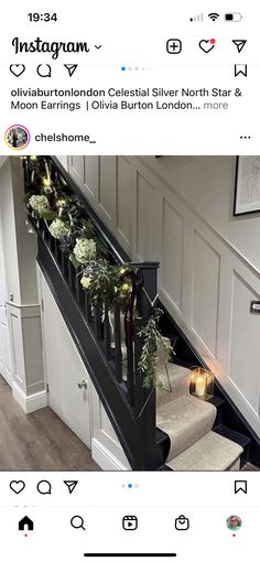 the stairs are decorated with greenery and candles for an elegant touch to any home