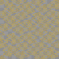 a gray and yellow pattern with swirls on it