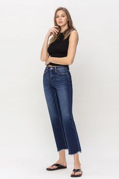 Flying Monkey High Rise Raw Hem Straight Jeans Comfort stretch denim designed with a high-rise silhouette, straight cut, medium wash, and finished with a raw hem. These jeans provide a flattering fit and classic style that is versatile for pairing with a variety of tops. Fit: True to size. Sizing: 24(0), 25(1), 26(3), 27(5), 28(7), 29(9), 30(11), 31(13), 32(15) Rise: 10" Fabric Content: 65% Cotton / 21% Polyester / 12%Viscose / 2% SpandexModel is 5'9" wearing size 26 *Online Exclusive* Everyday Dark Wash Flare Jeans With Frayed Hem, Dark Wash Mid-rise Cropped Jeans With Frayed Hem, High Rise Dark Wash Cropped Jeans With Frayed Hem, Medium Wash Straight Cropped Jeans With Frayed Hem, Straight Cropped Jeans With Frayed Hem In Medium Wash, Sleeveless Kimono, China Style, Timeless Wardrobe, Flying Monkey