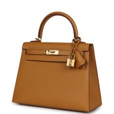 This Kelly, in the Sellier style, is in Sesame epsom leather with gold hardware and has tonal stitching, front flap, two straps with center toggle closure, clochette with lock and two keys a single rolled handle and removable shoulder strap.The interior is lined with Sesame chevre leather and has one zip pocket with an Hermes engraved pull and one open pocket on the opposite side.Collection: BOrigin: FranceCondition: New and never worn (plastic on hardware)Accompanied by: Hermes box, Hermes dustbag, clochette, lock, two keys, shoulder strap, clochette dustbag, shoulder strap dustbag, felt, carebookMeasurements: 9.8" width x 7.5" height x 3.5" depth; 3.5" handle drop (16.5" shoulder strap drop) Hermes Kelly Aesthetic, Hermes Kelly Sellier, Hermes Kelly 25, Kelly Sellier, Hermes Birkin 25, Hermes Box, Birkin 25, Hermes Birkin, Leather Craft