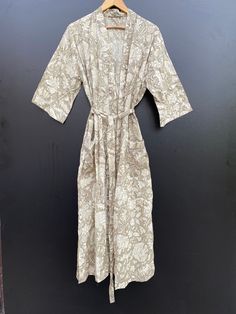 "Handmade Size: one size us women's letter Description Cotton kimono robes are perfect for lounging around the home or spa. Use our block print robe as a cover up on the beach or after a dip in the pool. Add a luxe, boho feel to your bridal shower. Versatile, soft and luxurious, our 100% cotton kimono robes are printed with azo-free dyes. The block print floral robe features 3/4th sleeves, a waist tie and two front pocket. Size - One size will fit sizes S to XL Length - 50 inches (125 Centimeter Relaxed Fit Robe With Kimono Sleeves For Loungewear, Printed Dresses With Kimono Sleeves For Loungewear, Relaxed Fit Beige Kimono For Loungewear, Loungewear Robe With Relaxed Fit And Kimono Sleeves, Beige Relaxed Fit Kimono For Loungewear, Long Beige Robe For Loungewear, Printed Loungewear Dress With Kimono Sleeves, Printed Sleepwear With Kimono Sleeves For Loungewear, Long Printed Robe For Loungewear