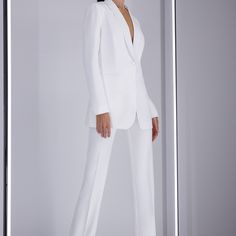 Chic Semi-formal Pantsuit With Notch Lapel, Spring Suits With Structured Boning And Suit Collar, Chic Tailored Sets With Lapel Collar, Tailored Long Sleeve Tuxedo Pantsuit, Tailored Tuxedo Style Pantsuit With Long Sleeves, Evening Pantsuit With Notch Lapel And Pressed Crease, Tailored Pantsuit With Lapel Collar For Semi-formal Occasions, Chic Semi-formal Suits With Structured Boning, Spring Semi-formal Tuxedo Pantsuit