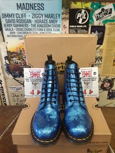 These Dr Martens 8 hole boots are beautiful in both colour and style. A Sapphire Blue coloured upper that has that unique holographic look. The uppers are wipe clean and are a mix of leather and textile. These are the traditional 8 hole boot complete with trademark sole and yellow stitching.  These are a deleted model, we have a couple of pairs available but when they are gone they truly are. Blue Boots For Winter Streetwear, Blue Leather Boots For Streetwear, Zeus Children, Ziggy Marley, Combat Boots Style, Boots Style, Doc Martens, Sapphire Blue, Dr. Martens Boots