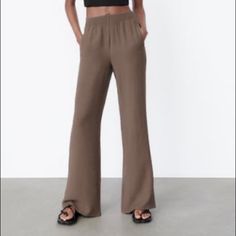 Brand New Size Medium Color:Taupe Chic Taupe Bottoms, Casual Taupe Bottoms With Elastic Waistband, Chic Taupe Wide Leg Pants, Chic Taupe Pants For Spring, Brown High Waist Linen Bottoms, Casual Taupe Wide Leg Bottoms, Casual Taupe Wide-leg Bottoms, High Waist Brown Linen Bottoms, Fitted Taupe Wide Leg Bottoms