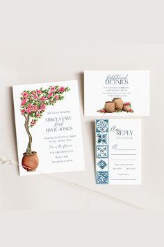 the wedding stationery is laid out on top of each other, including two cards and an envelope