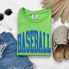 (1) 'Baseball' Graphic Tee – True to You Team-colored Graphic Print Baseball Jersey For Game Day, Team-colored Baseball Jersey With Graphic Print For Game Day, Collegiate Team-colored Baseball Jersey With Graphic Print, Game Day Sports Season T-shirt With Screen Print, Game Day T-shirt With Screen Print For Sports Season, Game Day Crew Neck Baseball Jersey, Varsity Screen Print Tops For Sports Season, Collegiate Baseball Jersey With Graphic Print, Game Day Fan Apparel Baseball Jersey With Crew Neck