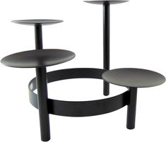 three round tables sitting on top of each other in front of a white background,